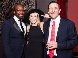 Tom and Linda Rizk with Wyclef Jean